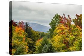 USA, Vermont, New England, Stowe Mt. Mansfield parking lot view with fog on mountains-Alison Jones-Stretched Canvas