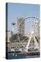 USA, WA, Seattle.Great Wheel on Pier 57 and cityscape.-Trish Drury-Stretched Canvas