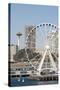 USA, WA, Seattle.Great Wheel on Pier 57 and cityscape.-Trish Drury-Stretched Canvas