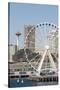 USA, WA, Seattle.Great Wheel on Pier 57 and cityscape.-Trish Drury-Stretched Canvas