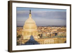 USA, Washington DC. Sunrise over the U.S. Capitol building and city.-Christopher Reed-Framed Photographic Print