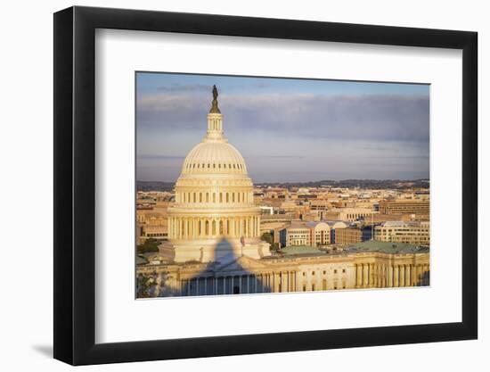 USA, Washington DC. Sunrise over the U.S. Capitol building and city.-Christopher Reed-Framed Photographic Print