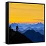USA, Washington State. A backpacker descending from the Skyline Divide at sunset.-Gary Luhm-Framed Stretched Canvas