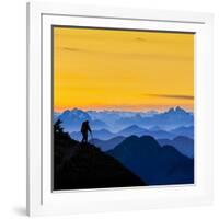 USA, Washington State. A backpacker descending from the Skyline Divide at sunset.-Gary Luhm-Framed Photographic Print