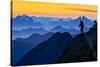 USA, Washington State. A backpacker descending from the Skyline Divide at sunset.-Gary Luhm-Stretched Canvas