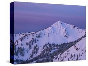 Usa, Washington State, Crystal Mountain. 'The King' summit and snow-filled bowls at sunset.-Merrill Images-Stretched Canvas