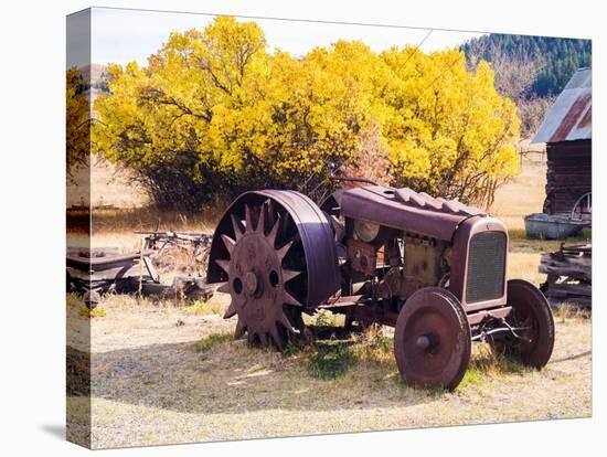 USA, Washington State, Molson, Okanogan County. Rusty old tractor in the historic ghost town.-Julie Eggers-Stretched Canvas