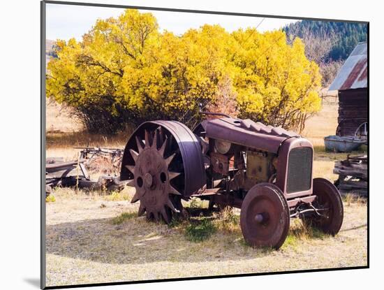 USA, Washington State, Molson, Okanogan County. Rusty old tractor in the historic ghost town.-Julie Eggers-Mounted Photographic Print