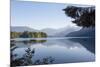 USA, Washington State. Morning calm Baker Lake under Mt. Shuksan. God Rays and two fishing boats-Trish Drury-Mounted Photographic Print