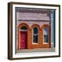 USA, Washington State, Pomeroy. Colorful old building with arched windows and doorway with scale-Sylvia Gulin-Framed Photographic Print