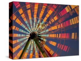 USA, Washington State, Puyallup, ferris wheel in motion at annual Puyallup Fair at night.-Merrill Images-Stretched Canvas