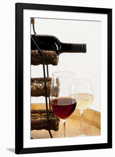 USA, Washington State, Seattle. Glass of red and white wine on a barrel.-Richard Duval-Framed Photographic Print