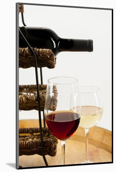 USA, Washington State, Seattle. Glass of red and white wine on a barrel.-Richard Duval-Mounted Photographic Print