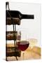 USA, Washington State, Seattle. Glass of red and white wine on a barrel.-Richard Duval-Stretched Canvas