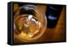 USA, Washington State, Seattle. Wine bottles are reflected in a glass of L'Orange, a Pinot Gris mad-Richard Duval-Framed Stretched Canvas