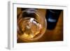 USA, Washington State, Seattle. Wine bottles are reflected in a glass of L'Orange, a Pinot Gris mad-Richard Duval-Framed Photographic Print