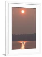 USA, Washington State. Two people in sailboat. Smoky skies from wildfires create eerie sunset-Trish Drury-Framed Photographic Print