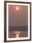 USA, Washington State. Two people in sailboat. Smoky skies from wildfires create eerie sunset-Trish Drury-Framed Photographic Print