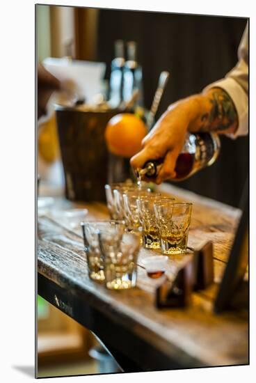 USA, Washington State, Woodinville. Bourbon whiskey pouring at a tasting room.-Richard Duval-Mounted Photographic Print