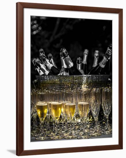 USA, Washington, Woodinville. Sparkling wine bottles and glasses ready for tasting at a wine event.-Richard Duval-Framed Photographic Print