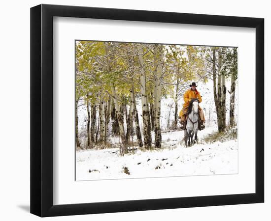USA, Wyoming, Shell, Big Horn Mountains, Cowboys riding through with fresh snowfall-Terry Eggers-Framed Photographic Print