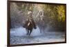 USA, Wyoming, Shell, The Hideout Ranch, Cowboy and Cowgirl on Horseback Running through the River-Hollice Looney-Framed Photographic Print