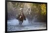 USA, Wyoming, Shell, The Hideout Ranch, Cowboy and Cowgirl on Horseback Running through the River-Hollice Looney-Framed Photographic Print