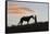 USA, Wyoming, Shell, The Hideout Ranch, Silhouette of Cowgirl with Horse at Sunset-Hollice Looney-Framed Stretched Canvas
