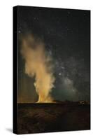 USA, Wyoming, Yellowstone NP. Milky Way and erupting Old Faithful Geyser.-Jaynes Gallery-Stretched Canvas