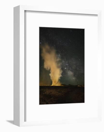 USA, Wyoming, Yellowstone NP. Milky Way and erupting Old Faithful Geyser.-Jaynes Gallery-Framed Photographic Print