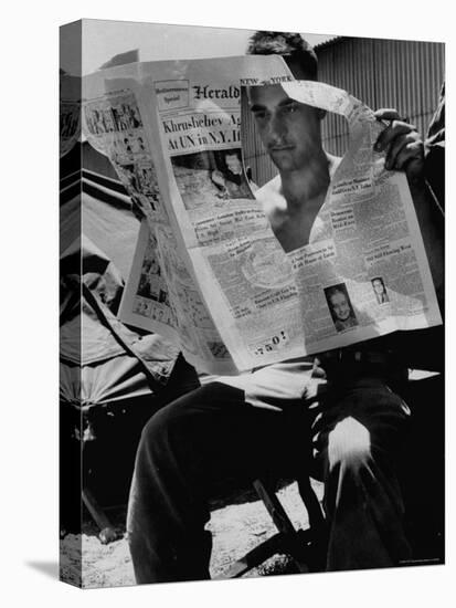 USMC Pfc Ronald M. Clarke Attempting to Read Heavily Censored New York Herald Tribune in Lebanon-Hank Walker-Stretched Canvas