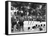 USO Chorus Girls Doing High-Kicks in Swimsuits During Impromptu Song and Dance on Beach-Peter Stackpole-Framed Stretched Canvas