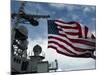 USS Cowpens Flies a Large American Flag During a Live Fire Weapons Shoot-Stocktrek Images-Mounted Photographic Print