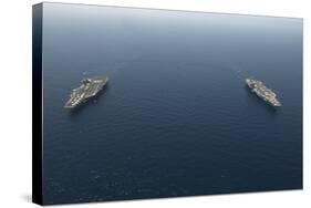 Uss George H.W. Bush Transits Alongside USS Harry S. Truman-null-Stretched Canvas