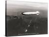 USS Macon over the Golden Gate and Pacific Fleet, 1934-Clyde Sunderland-Stretched Canvas