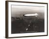 USS Macon over the Golden Gate and Pacific Fleet, 1934-Clyde Sunderland-Framed Art Print