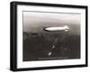 USS Macon over the Golden Gate and Pacific Fleet, 1934-Clyde Sunderland-Framed Art Print