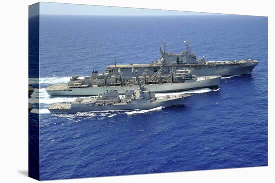 Uss Peleliu and USS Spruance Conduct a Replenishment at Sea with Usns Rainier-null-Stretched Canvas