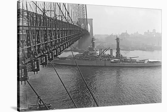 USS West Virgina Passing under Brooklyn Bridge-null-Stretched Canvas