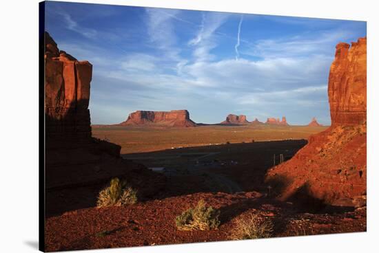 Utah. Arizona Border, Navajo Nation, Late Light on Monument Valley-David Wall-Stretched Canvas