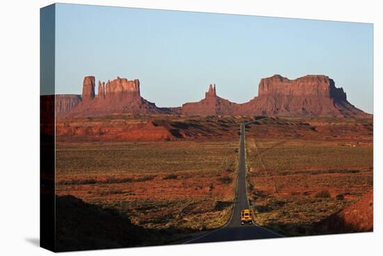 Utah, Navajo Nation, School Bus on U.S. Route 163-David Wall-Stretched Canvas