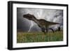 Utahraptor Running across an Open Field During a Lightning Storm-null-Framed Art Print