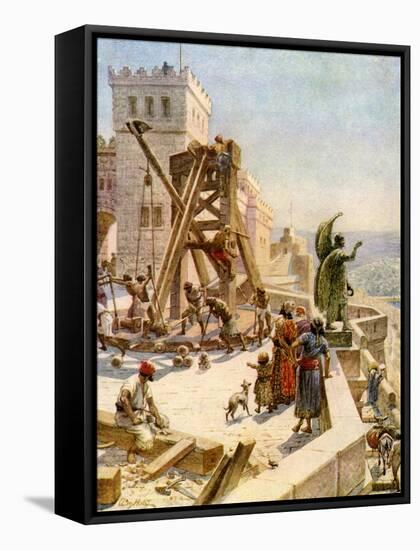 Uzziah erects engines of war on the walls - Bible-William Brassey Hole-Framed Stretched Canvas