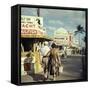 Vacationers Walking by Booths Advertising Boat Tours-Hank Walker-Framed Stretched Canvas