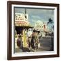 Vacationers Walking by Booths Advertising Boat Tours-Hank Walker-Framed Photographic Print