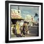 Vacationers Walking by Booths Advertising Boat Tours-Hank Walker-Framed Photographic Print