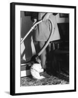 Vacuuming with a Chimp-null-Framed Photographic Print