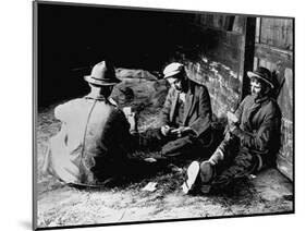 Vagrants Playing Cards in Railroad Car-null-Mounted Photographic Print