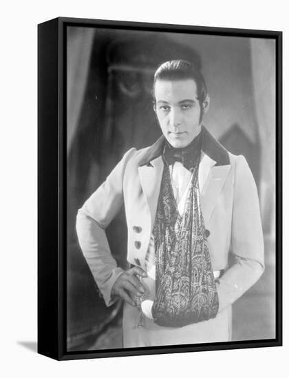 Valentino on the set of 'The Eagle' with his arm in a sling after a car accident, c.1925-null-Framed Stretched Canvas