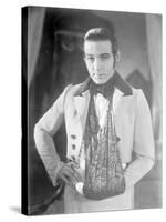 Valentino on the set of 'The Eagle' with his arm in a sling after a car accident, c.1925-null-Stretched Canvas